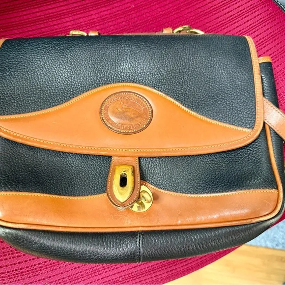 Black and Tan Leather Crossbody Messenger by Dooney and Bourke - Picture 1 of 5